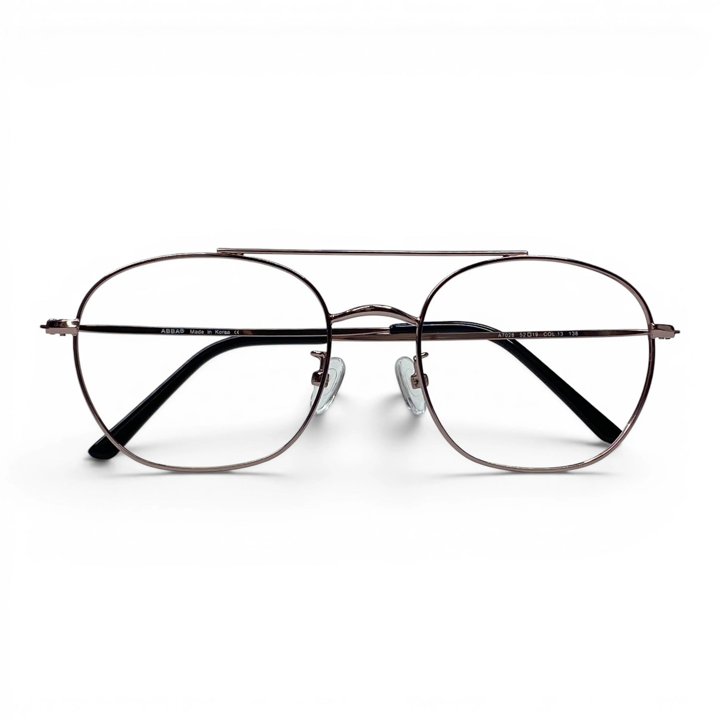 Rose gold pilot eyeglasses with thin metal frame and clear lenses on white background