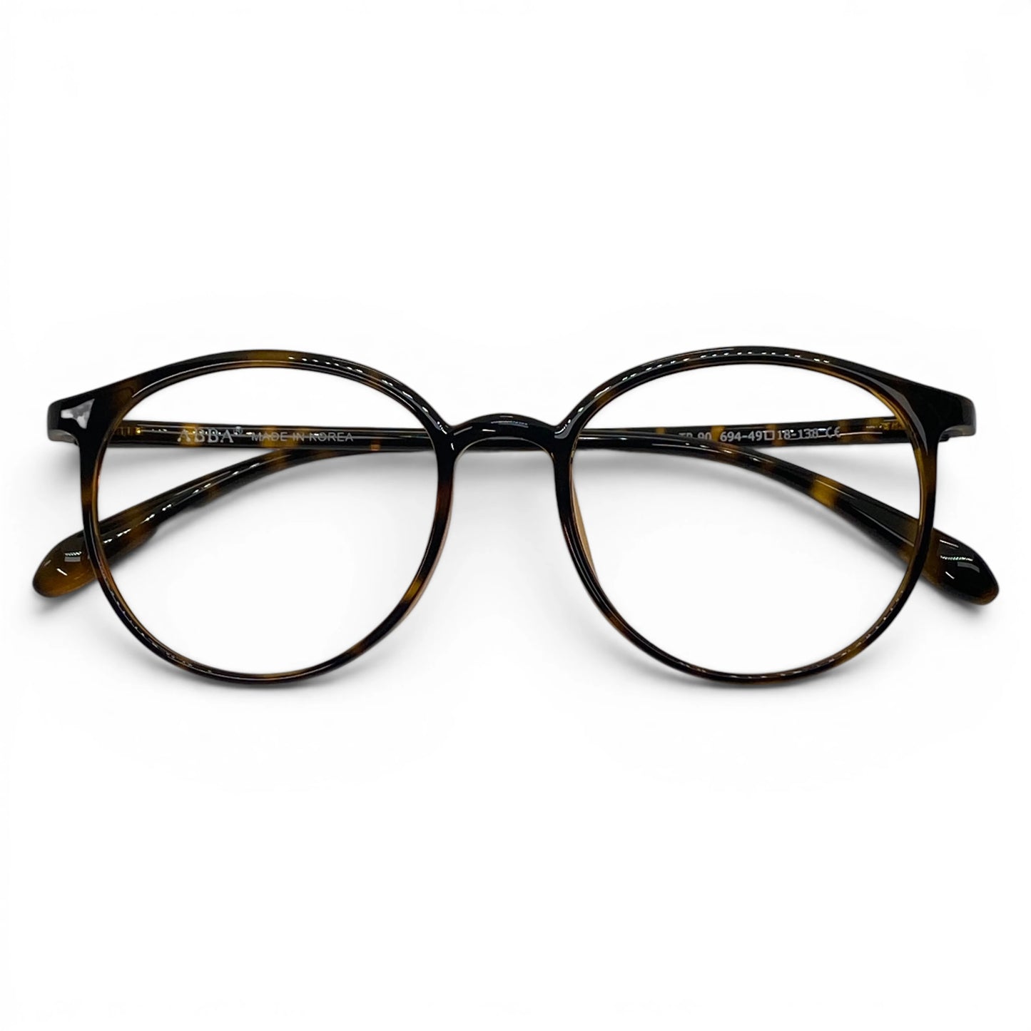 Round tortoiseshell eyeglasses with Havana brown pattern on white background