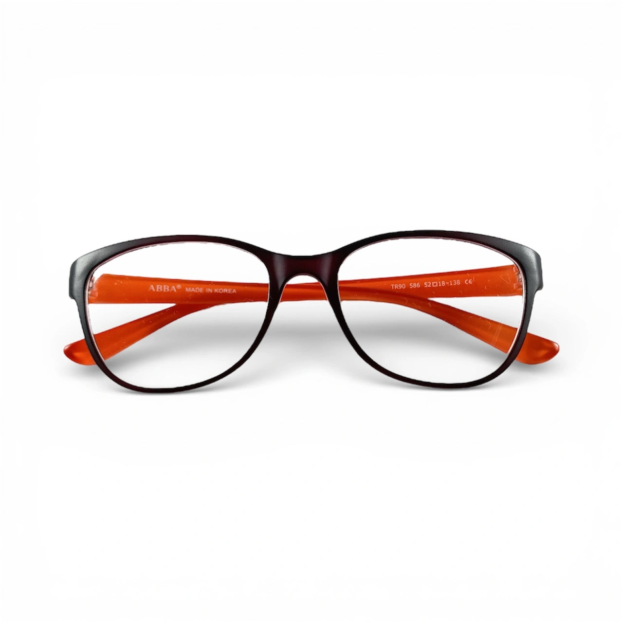 Brown and orange eyeglasses frame with clear lenses on white background