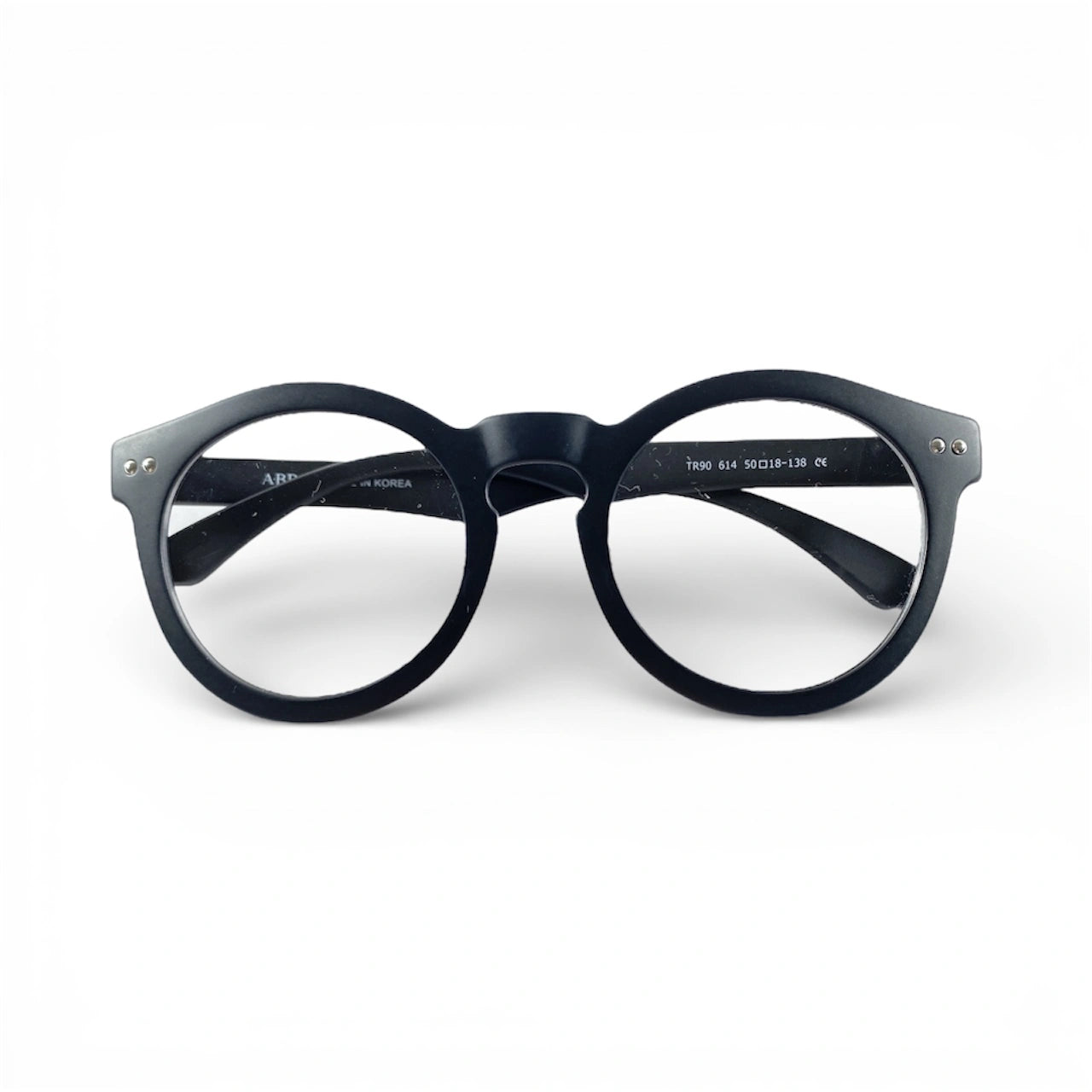 Black round eyeglasses frame with clear lenses on white background