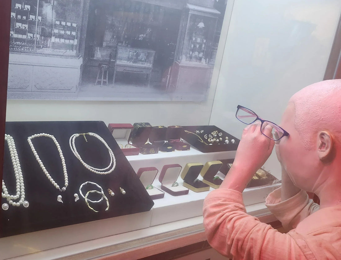Child with prescription glasses actively exploring a shop display, highlighting the need for durable frames for active kids.