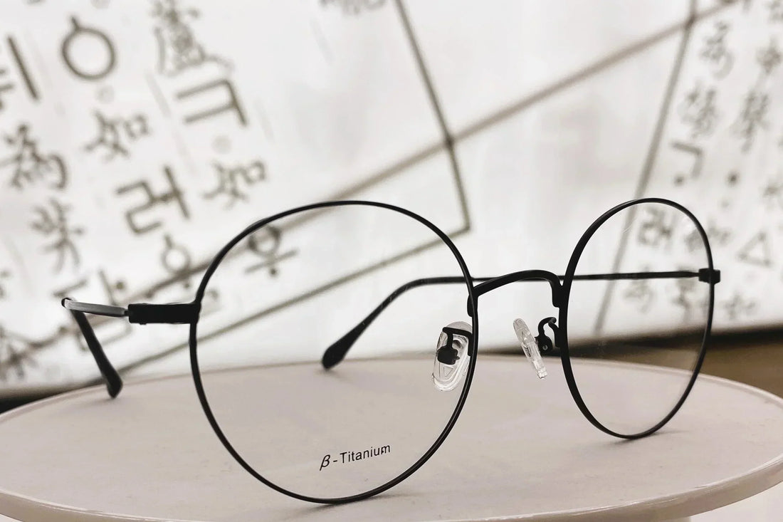 Beta titanium round glasses frame in black, showing premium quality Korean prescription glasses