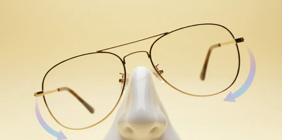Glasses sliding down nose showing glasses slipping problem caused by poor bridge fit and nose pad issues