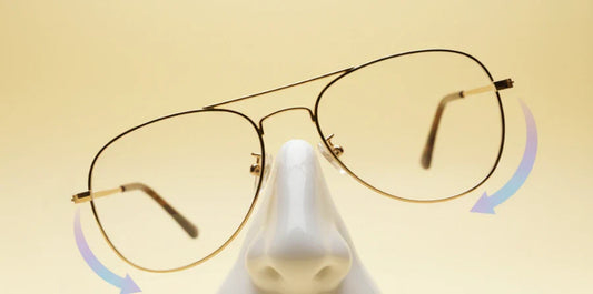 Glasses sliding down nose showing glasses slipping problem caused by poor bridge fit and nose pad issues