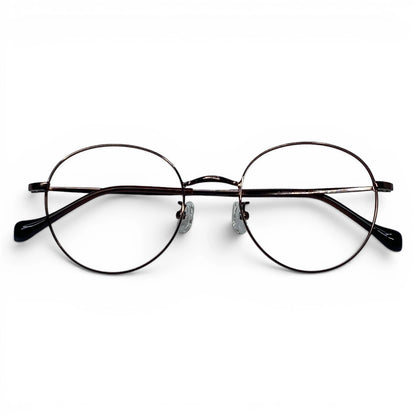 Dalbit 7011 round titanium prescription eyeglasses in bronze color, folded front view