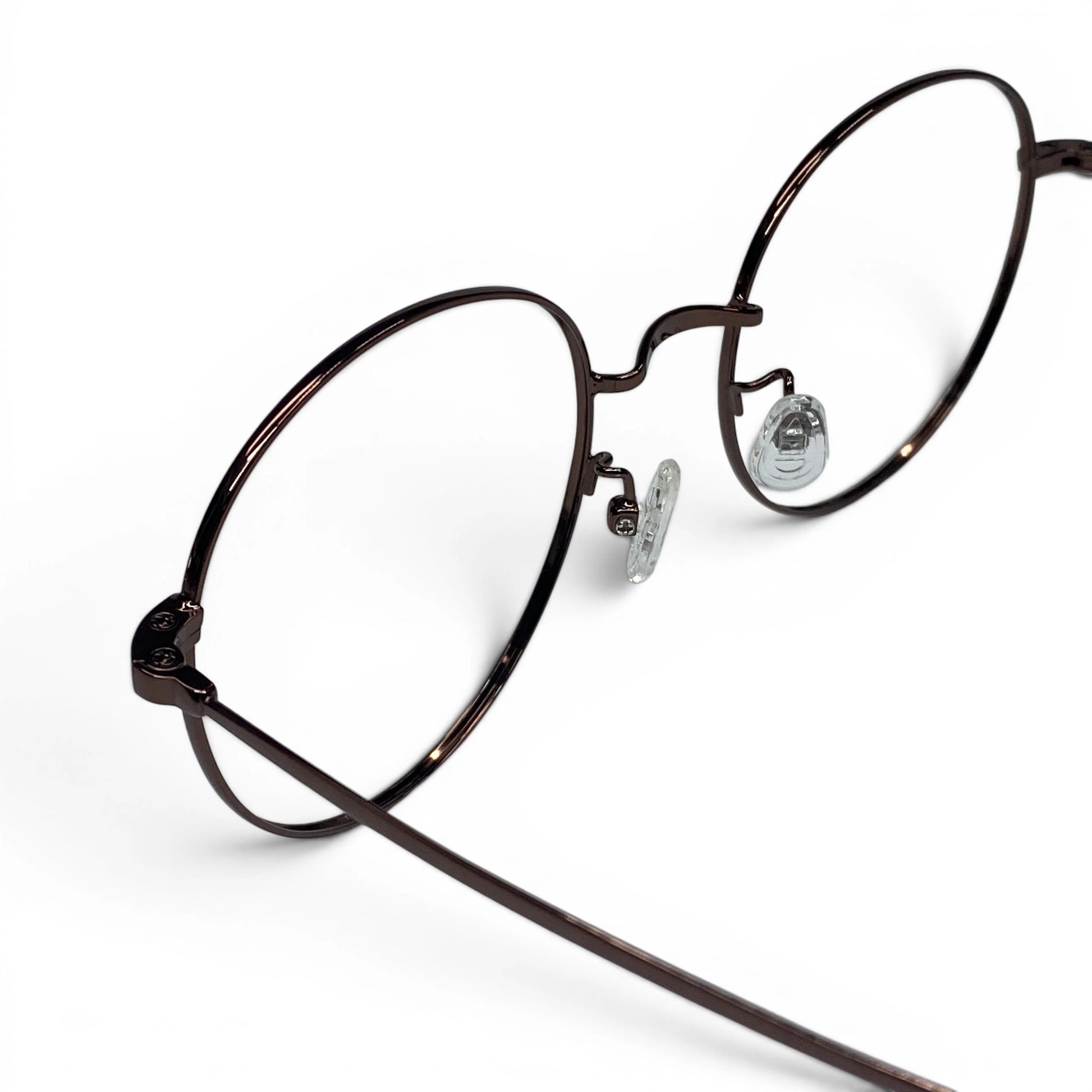 Dalbit 7011 round titanium prescription eyeglasses, close-up of adjustable nosepads