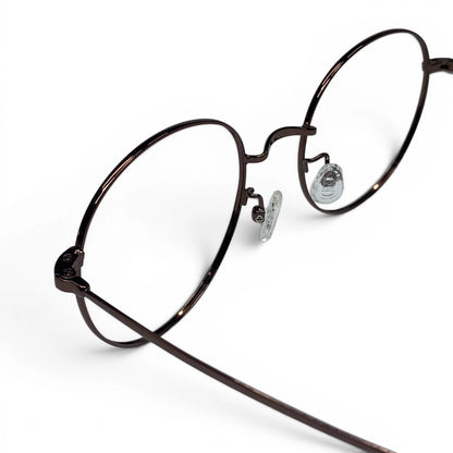 Dalbit 7011 round titanium prescription eyeglasses, close-up of adjustable nosepads
