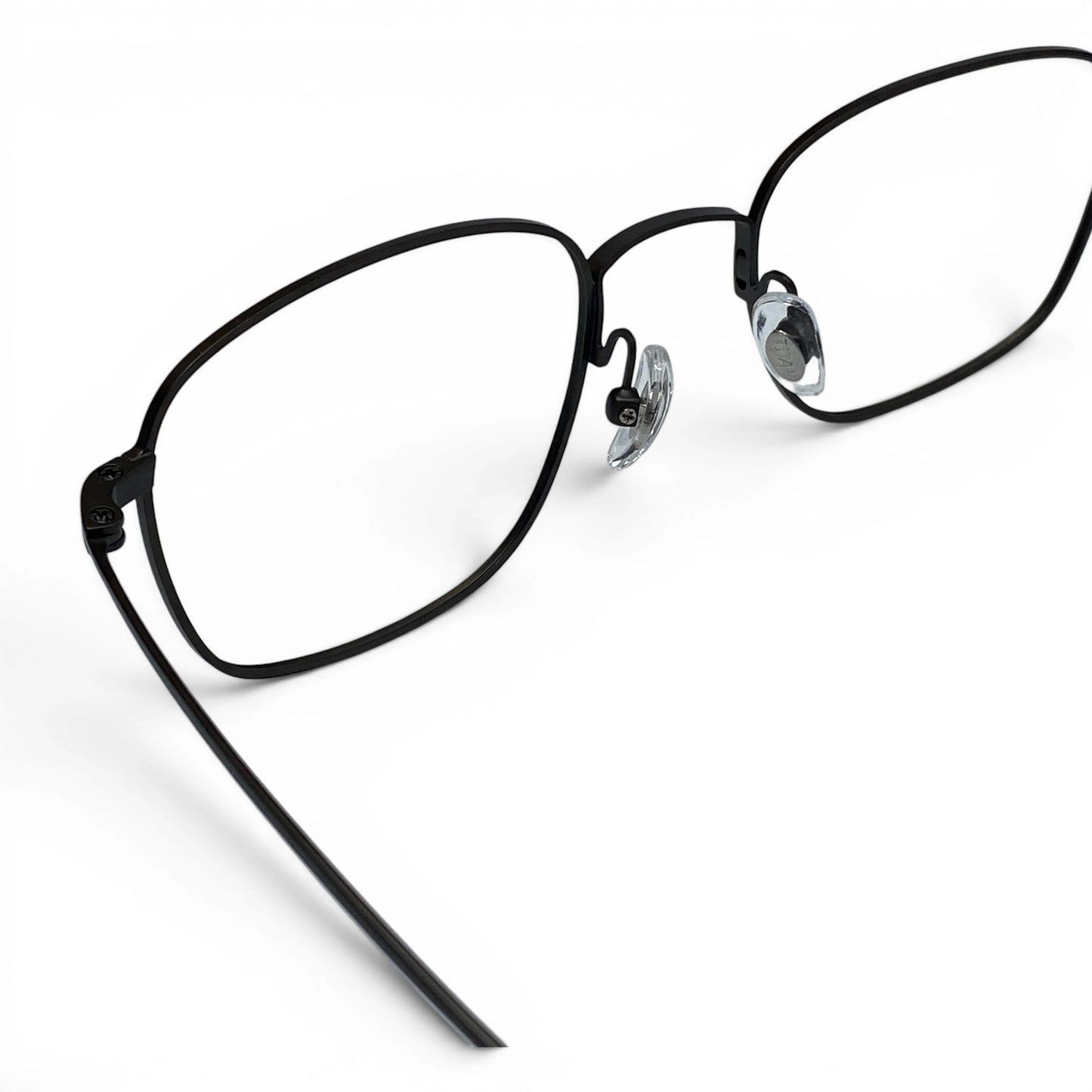 Hanok 104 square titanium prescription eyeglasses, close-up of adjustable nosepads