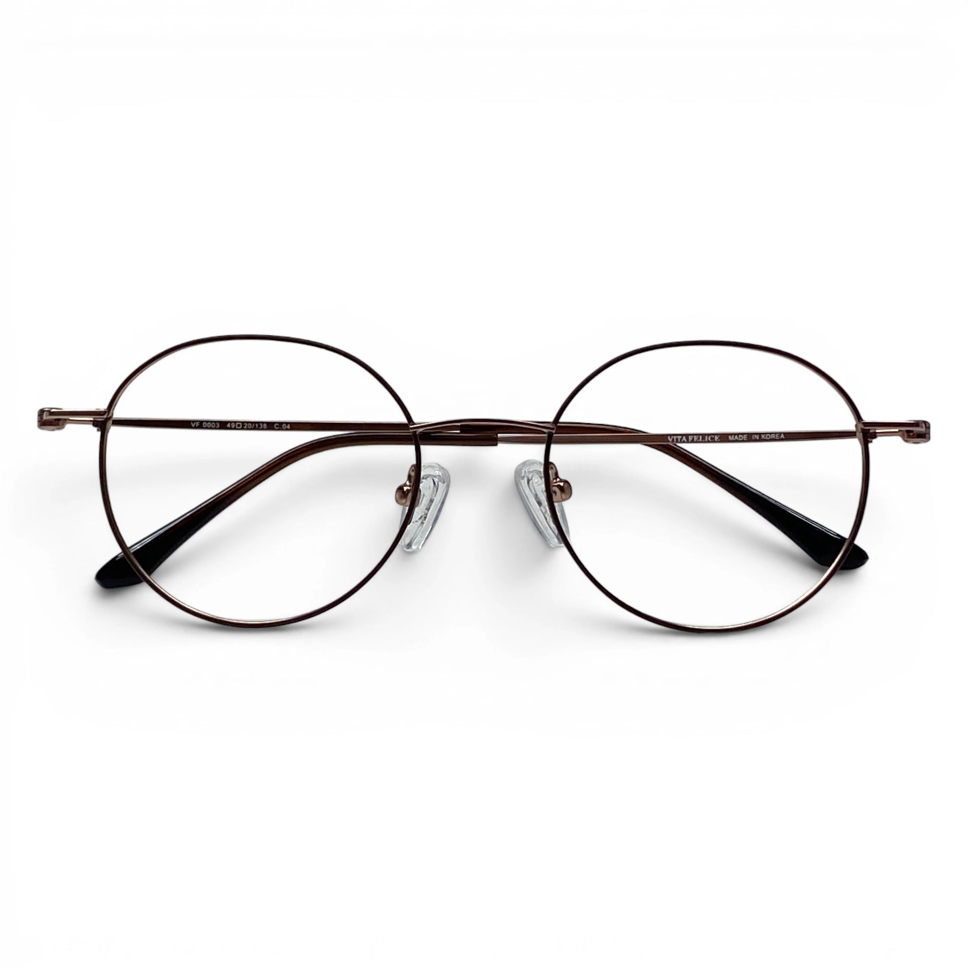Josun 3000 round titanium prescription eyeglasses in brown and gold, folded front view