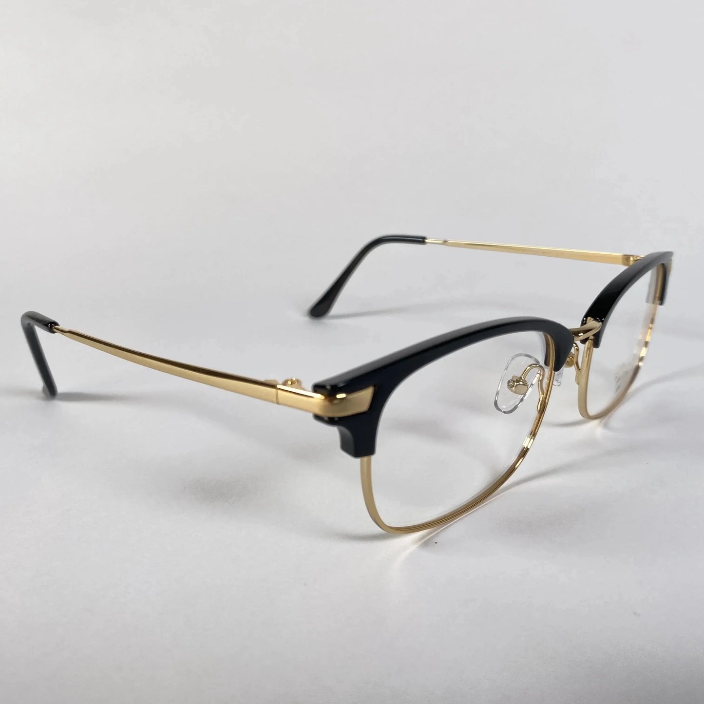 ClubVion 2035 semi-rimless glasses angle view - sophisticated black upper frame with sleek gold metal accents