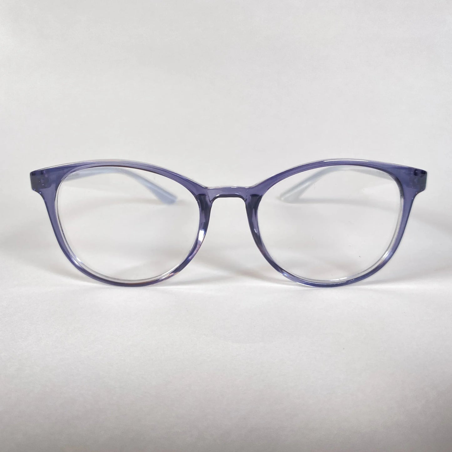 Round transparent navy eyeglasses with clear lenses on white background