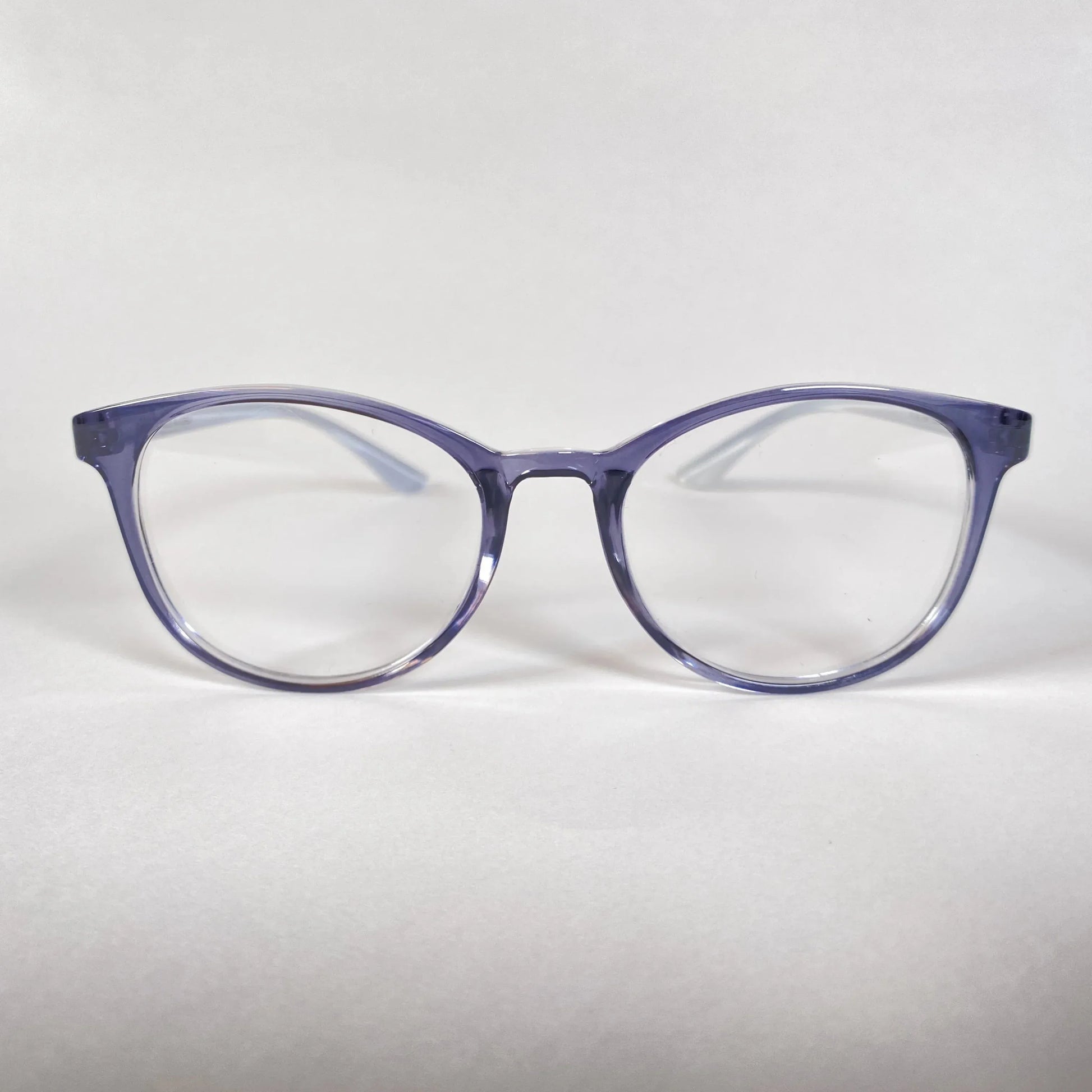 Round transparent navy eyeglasses with clear lenses on white background