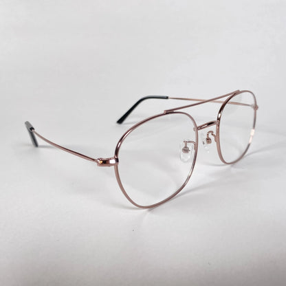 Rose gold aviator eyeglasses with clear lenses on white background