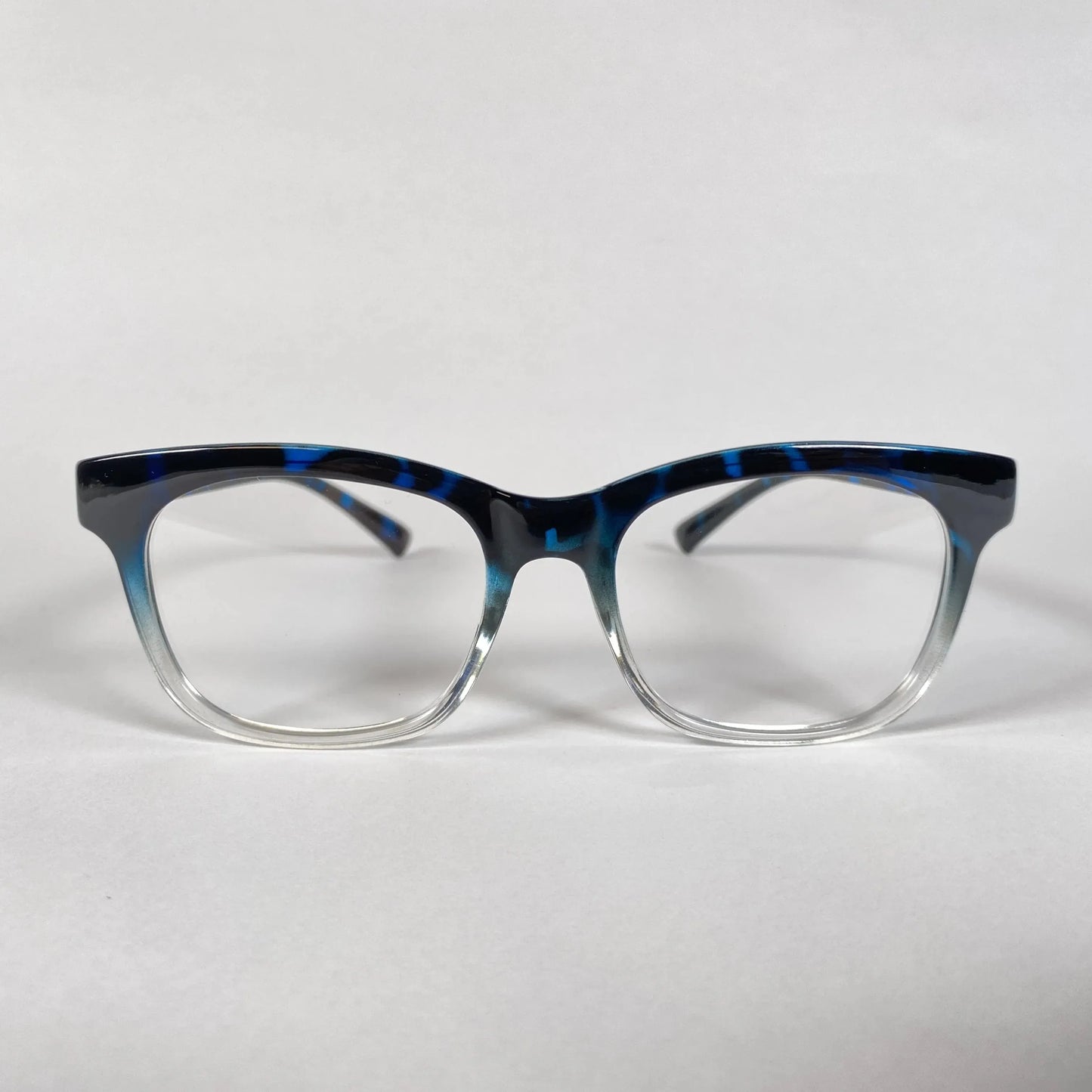 Blue marble pattern square eyeglass frame with gradient clear bottom on white background