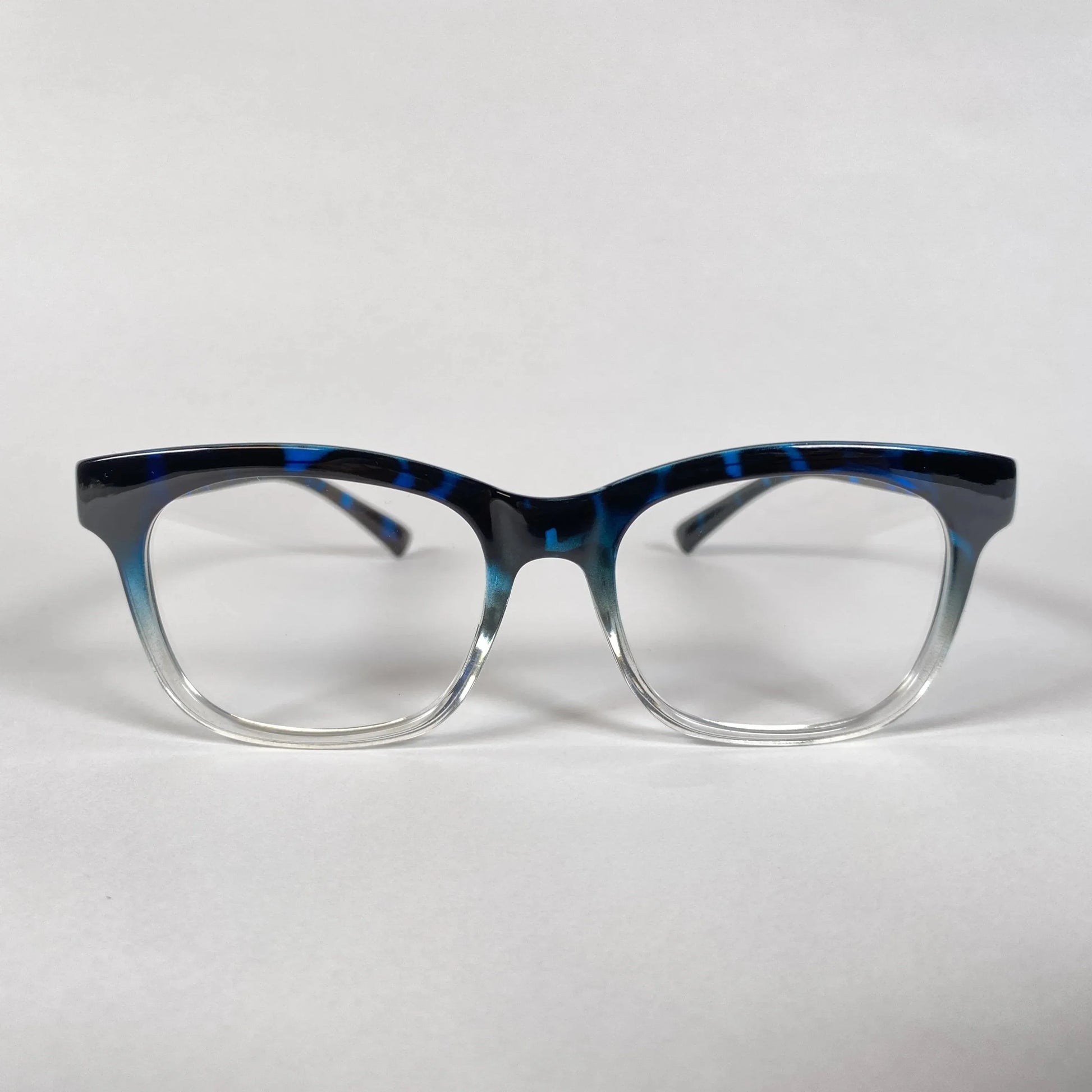 Blue marble pattern square eyeglass frame with gradient clear bottom on white background