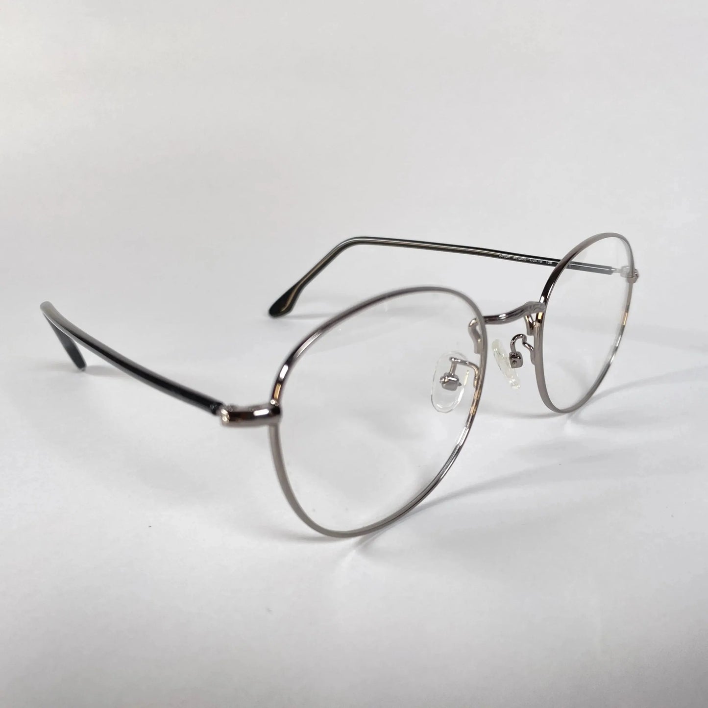 Melo 7025 round frame eyeglasses angle view - contemporary soft intellectual look with refined thin rims