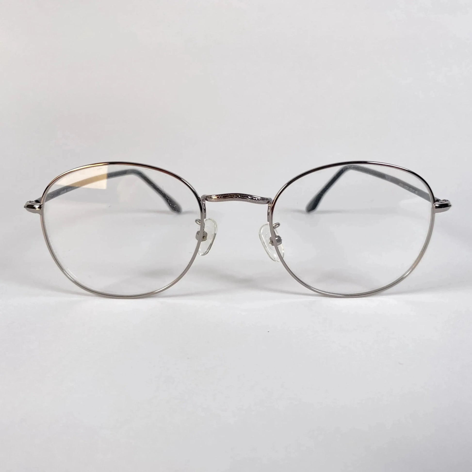 Melo 7025 round metal eyeglasses front view - thin stainless steel frame with adjustable nose pads as seen in Korean dramas