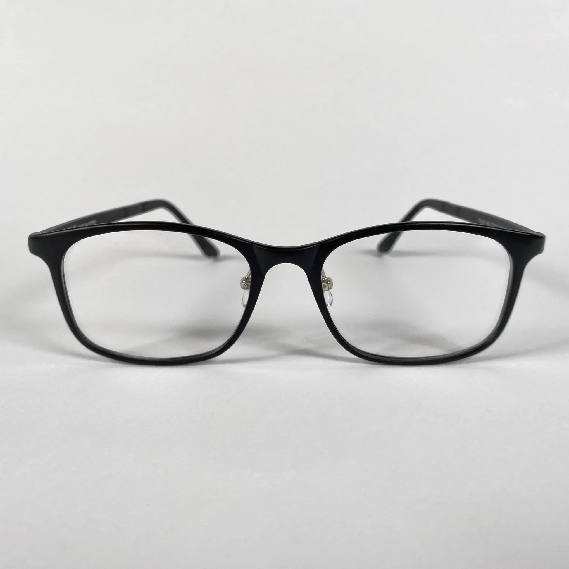 Black square eyeglasses with clear lenses on white background