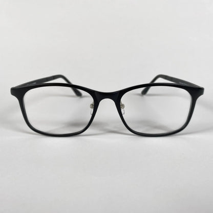 Black square eyeglasses with clear lenses on white background