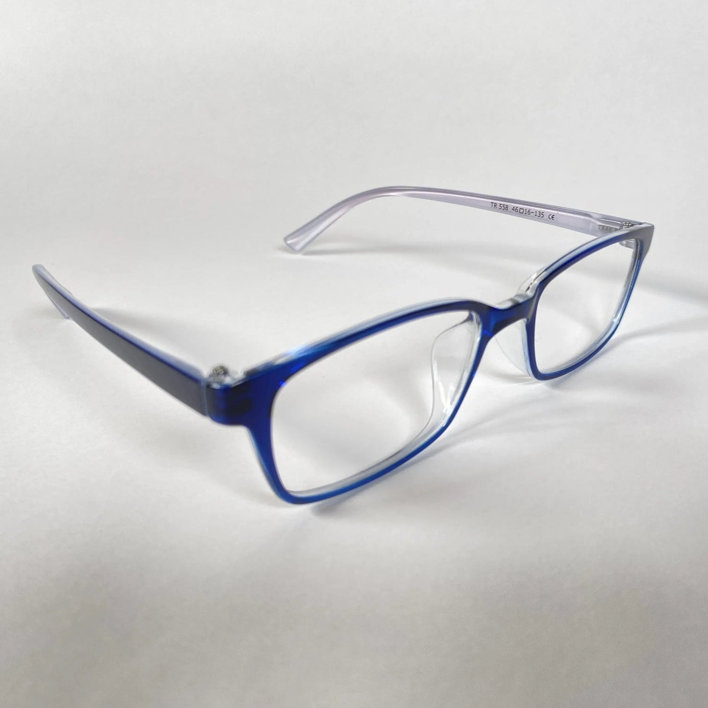 Blue kids eyeglasses with clear arms on white background