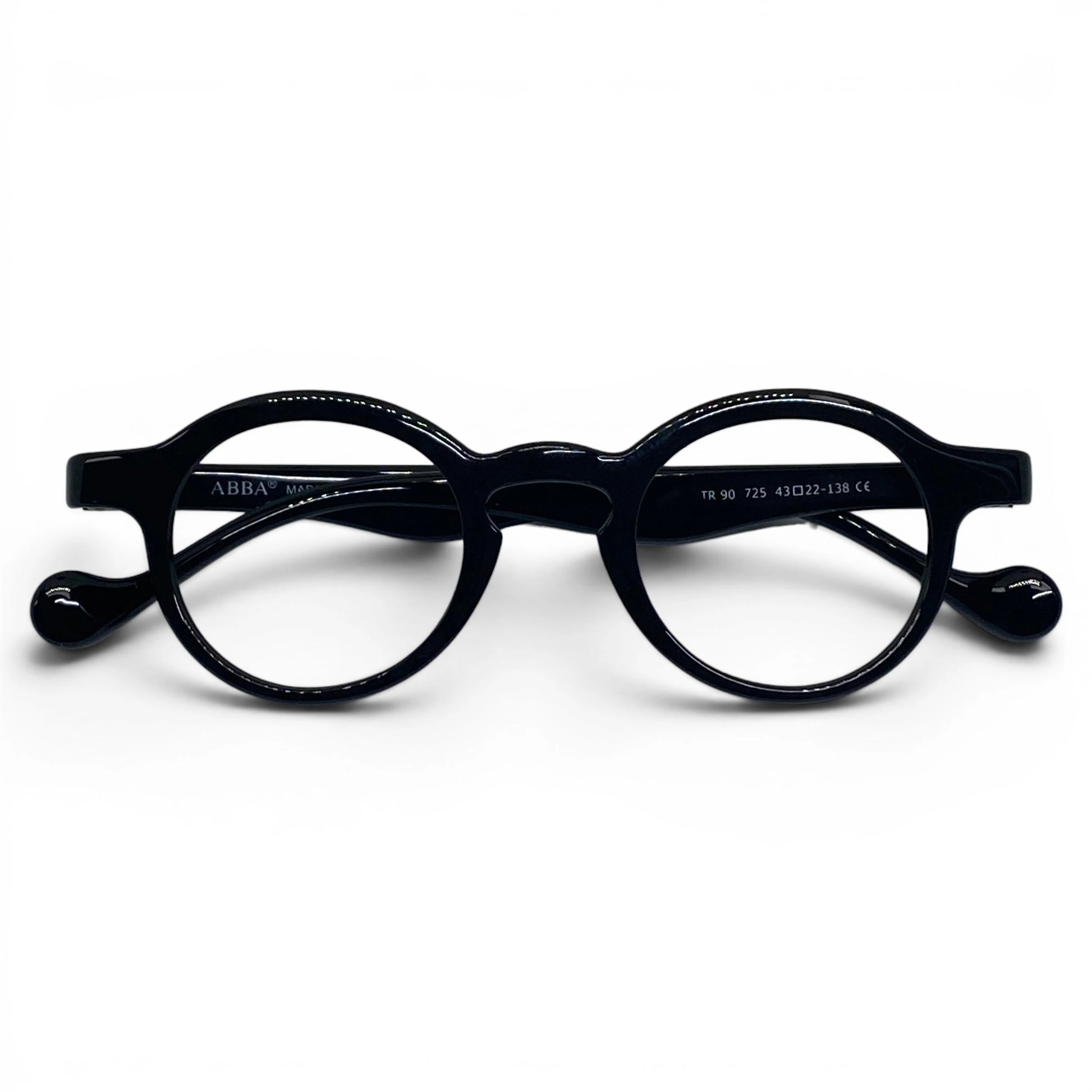 Soule 725 slim round black prescription eyeglasses with rounded temple tips, folded front view
