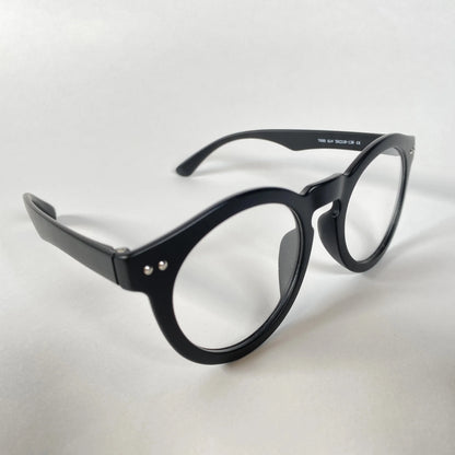 Black round eyeglasses with thick frames on a white background