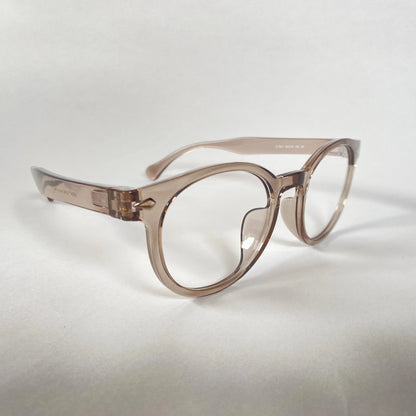 Grey transparent round eyeglasses with thick frames on a plain white background.